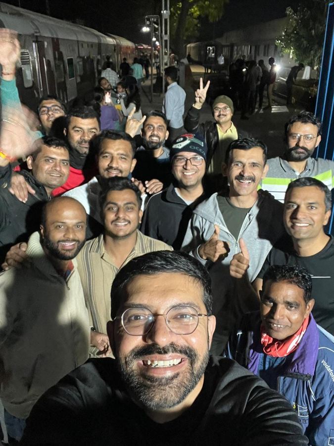 Bhuj Runners together on a station platform at night, on the way to a race
